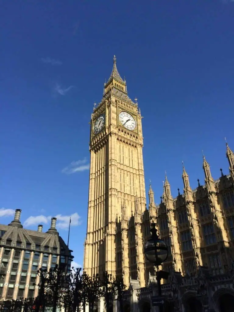Big Ben, a historic landmark in London, captured on a sunny day—an iconic site for students and tourists.