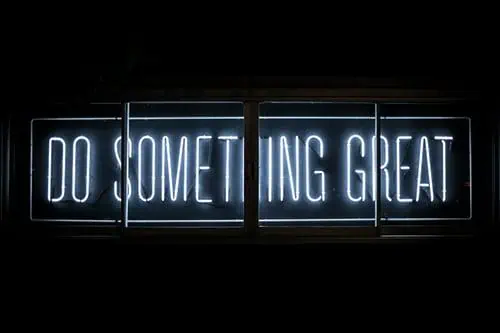Do Something Great neon sign encouraging students and immigrants to achieve career success with CV4Students. Join our platform to take the first step toward a brighter future | CV creation process