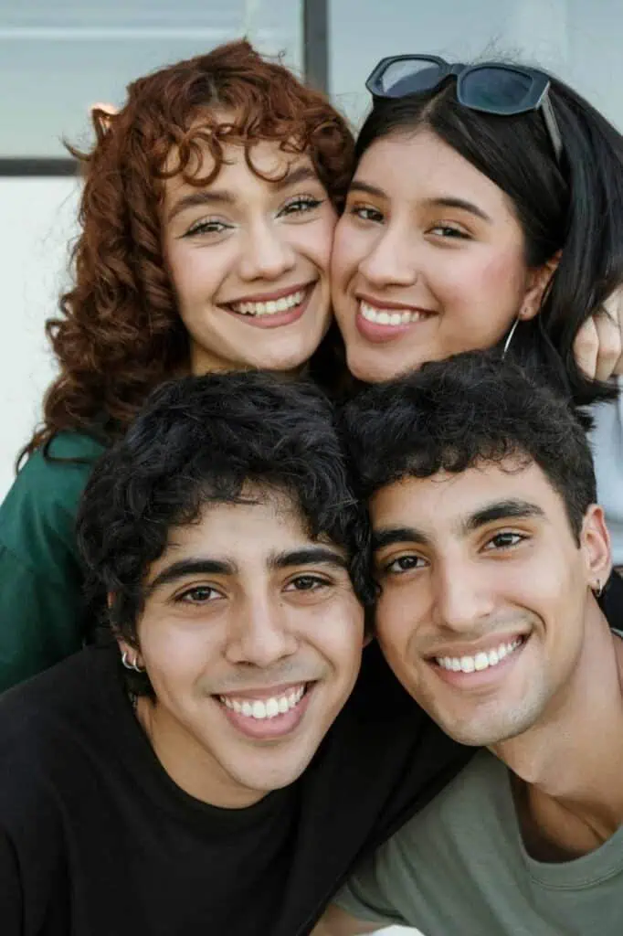 A group of happy Egyptian students smiling together, symbolizing career growth, academic success, and the benefits of expert re su me preparation services.