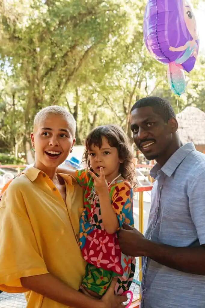 Happy immigrant family enjoying time together outdoors.