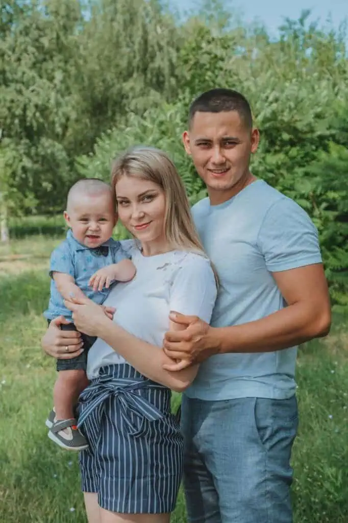 Happy immigrant family enjoying life outdoors.