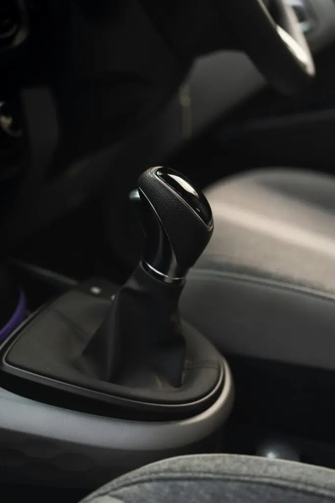Close-up of automatic gear shift inside modern vehicle interior