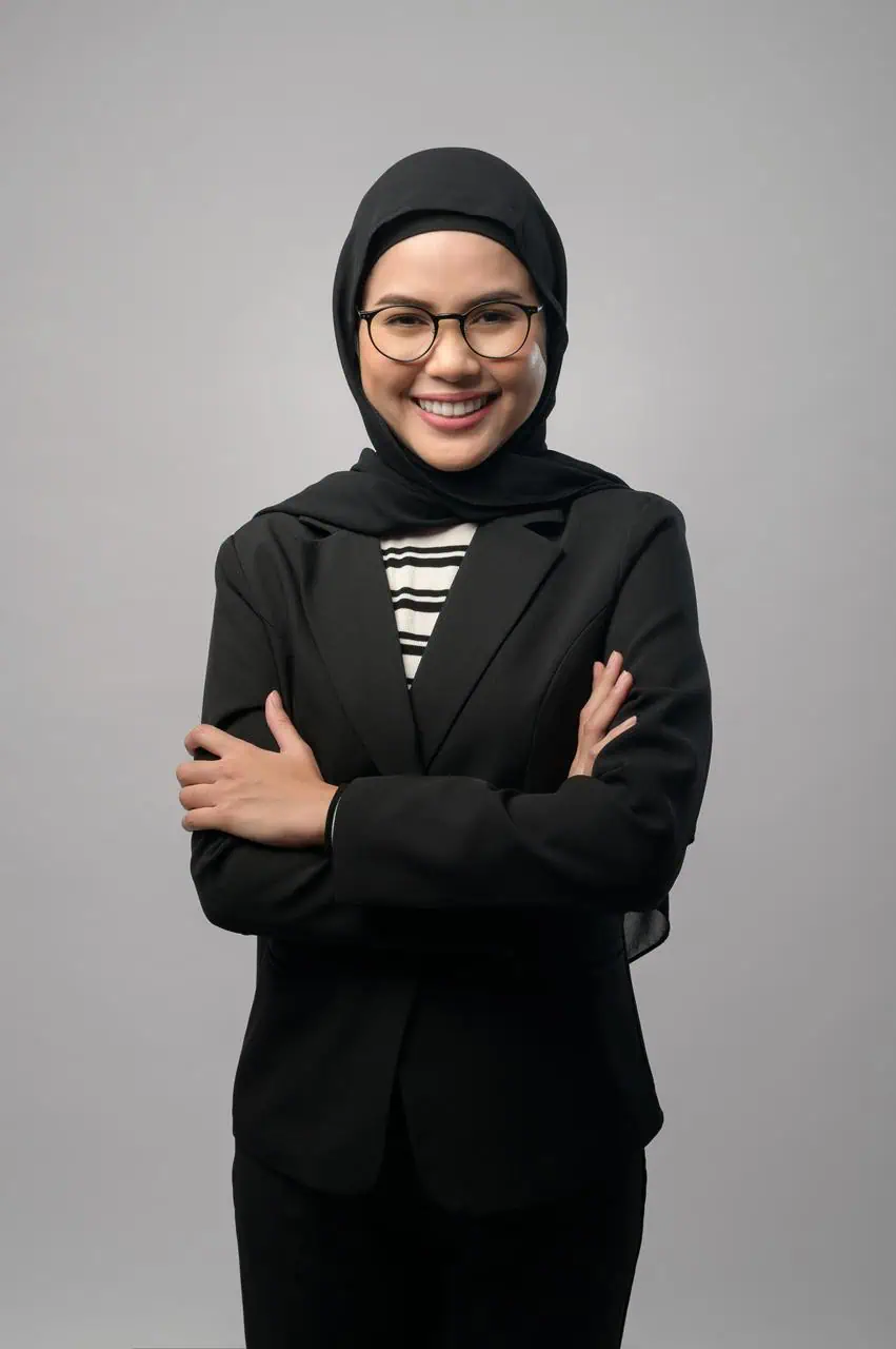 Tax consultant standing confidently in professional business attire